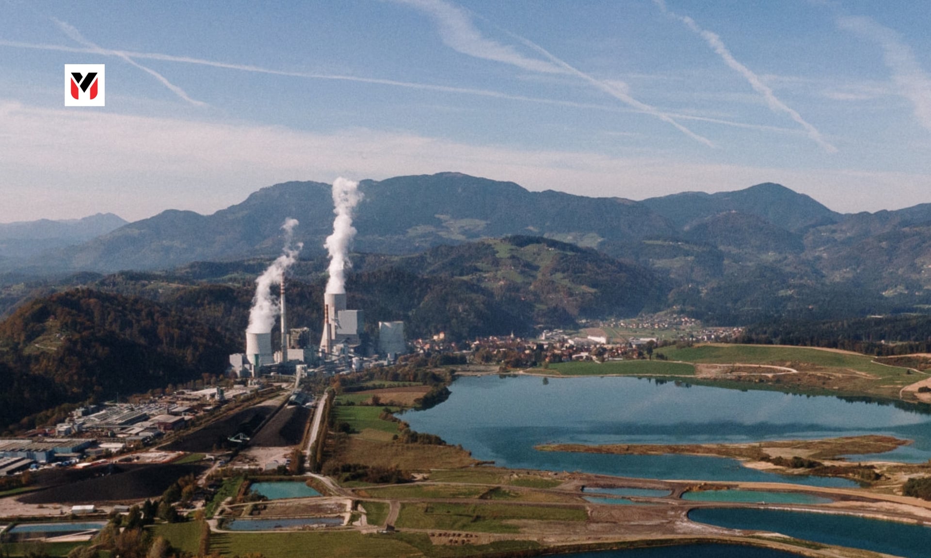A factory chimney with a scale balancing a certificate and a cloud
