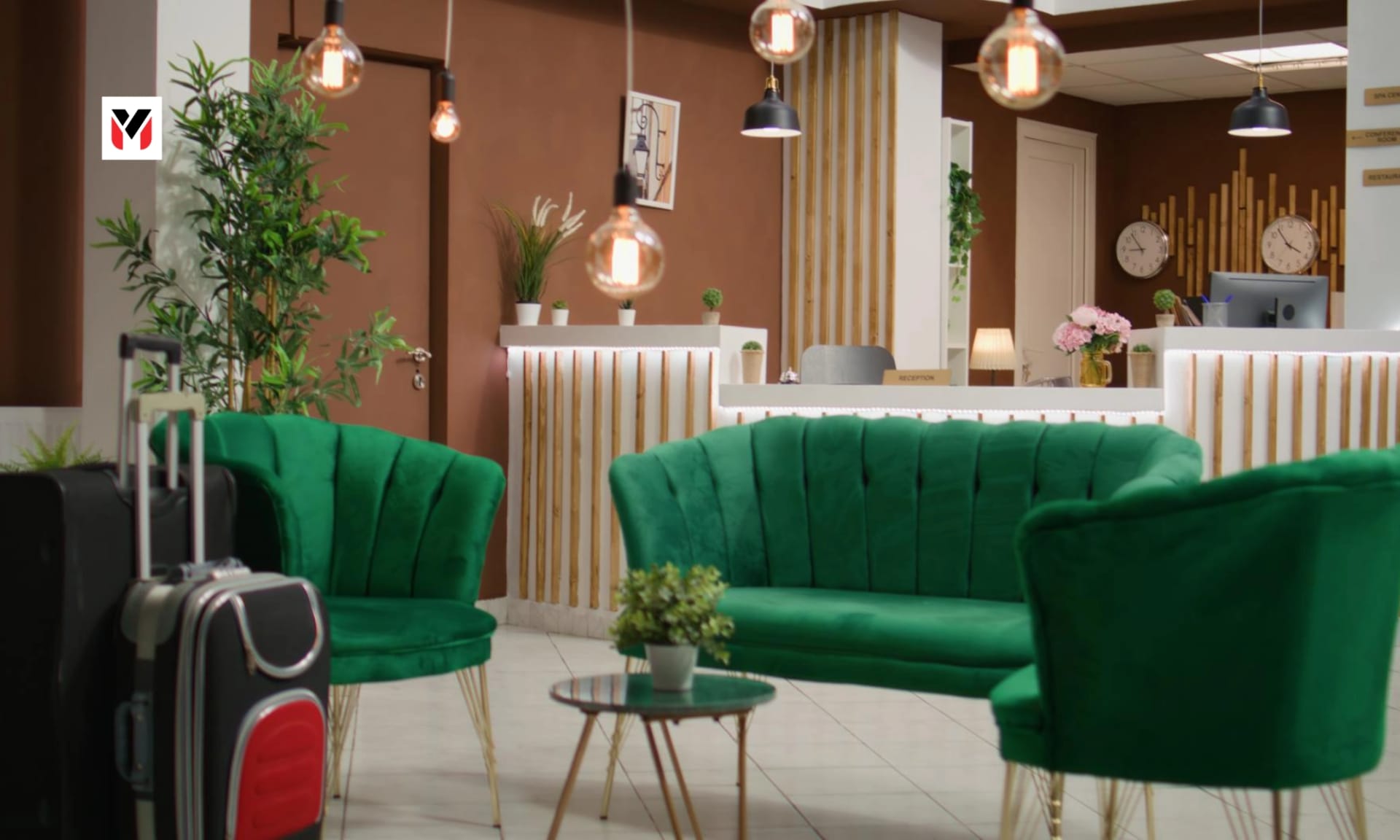 Boutique hotel lobby in a tier-2 Indian city with guests checking in